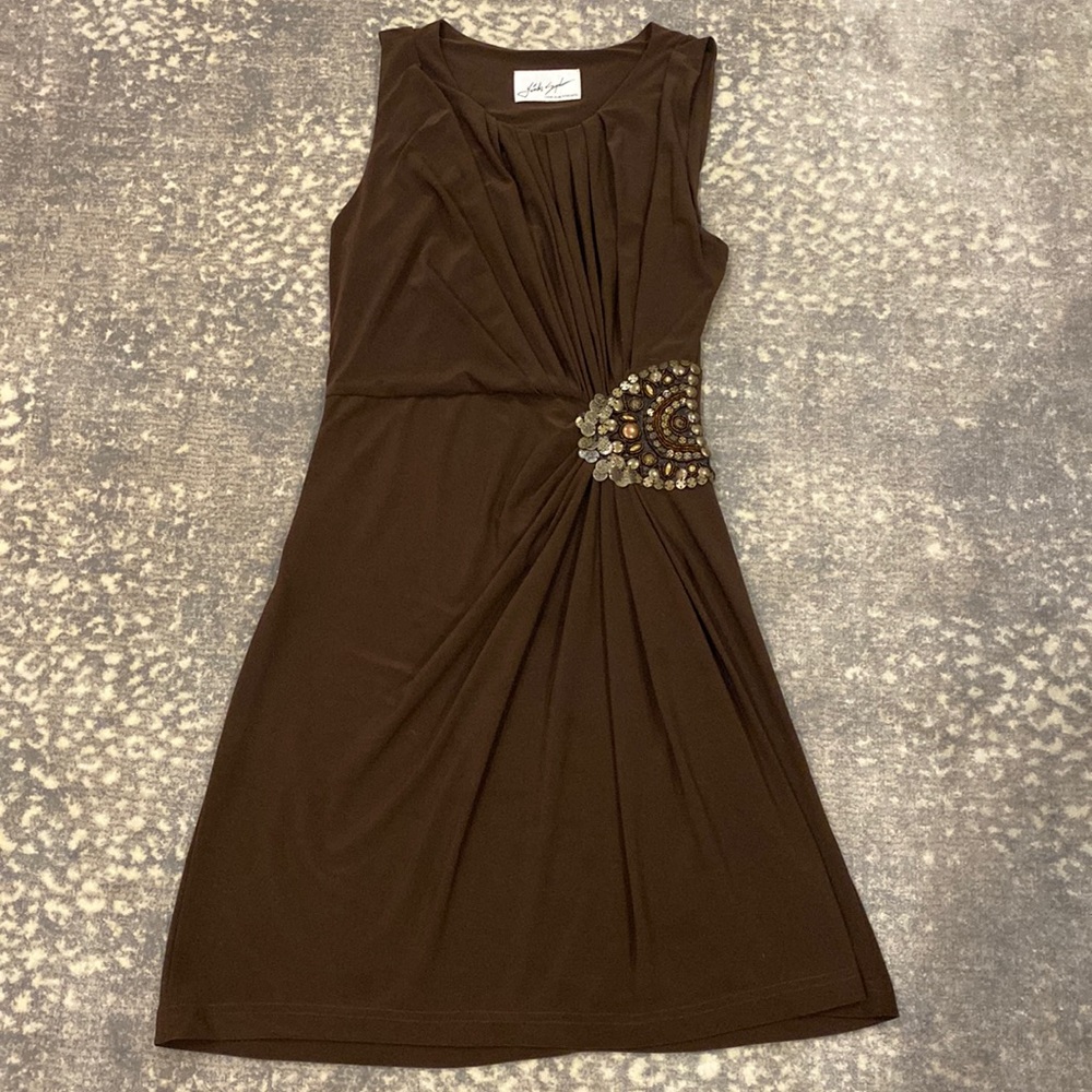 LINDA SEGAL BROWN DRESS WITH STUDS AND DISCS